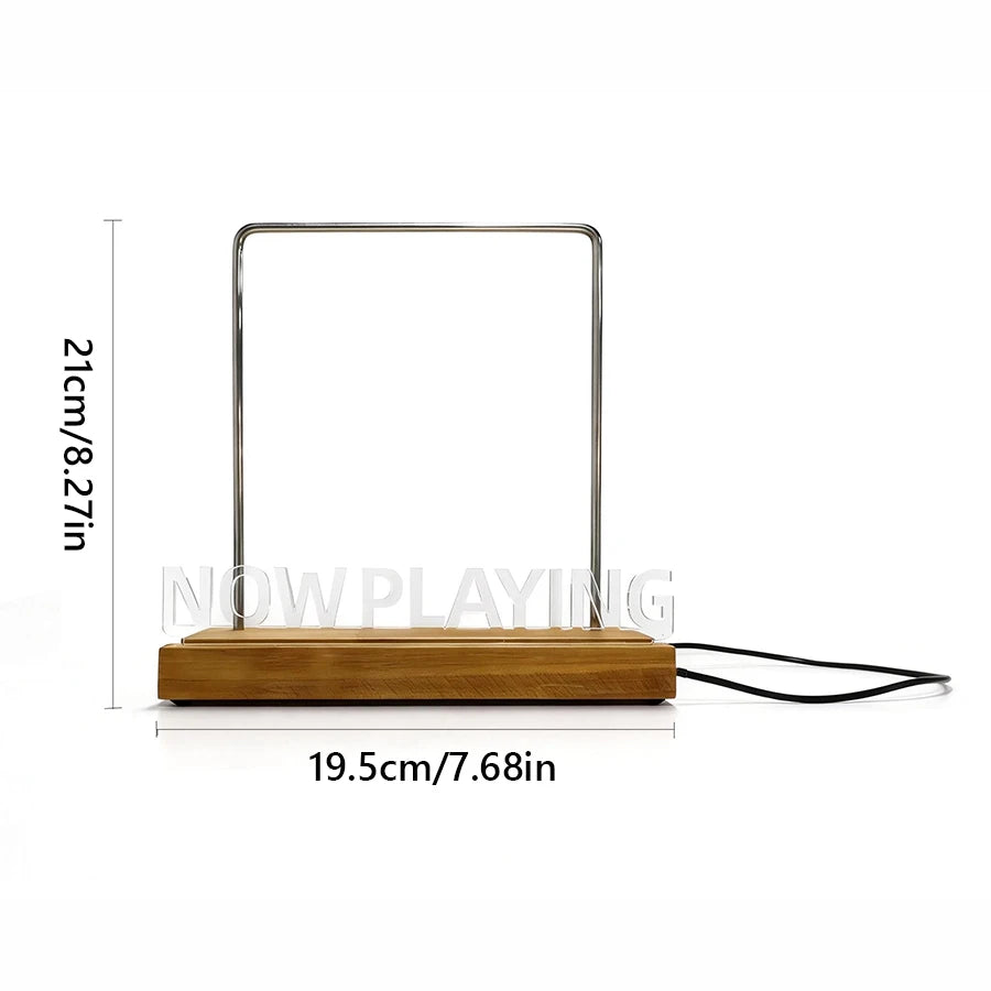 Wooden vinyl record stand with metal frame and 'Now Playing' text, showing dimensions on a white background.