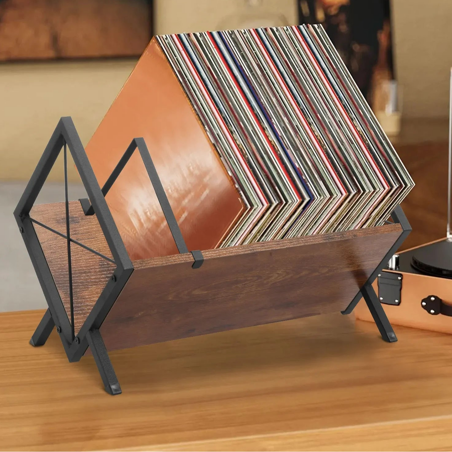 Wooden record holder with vinyl records on a wooden surface